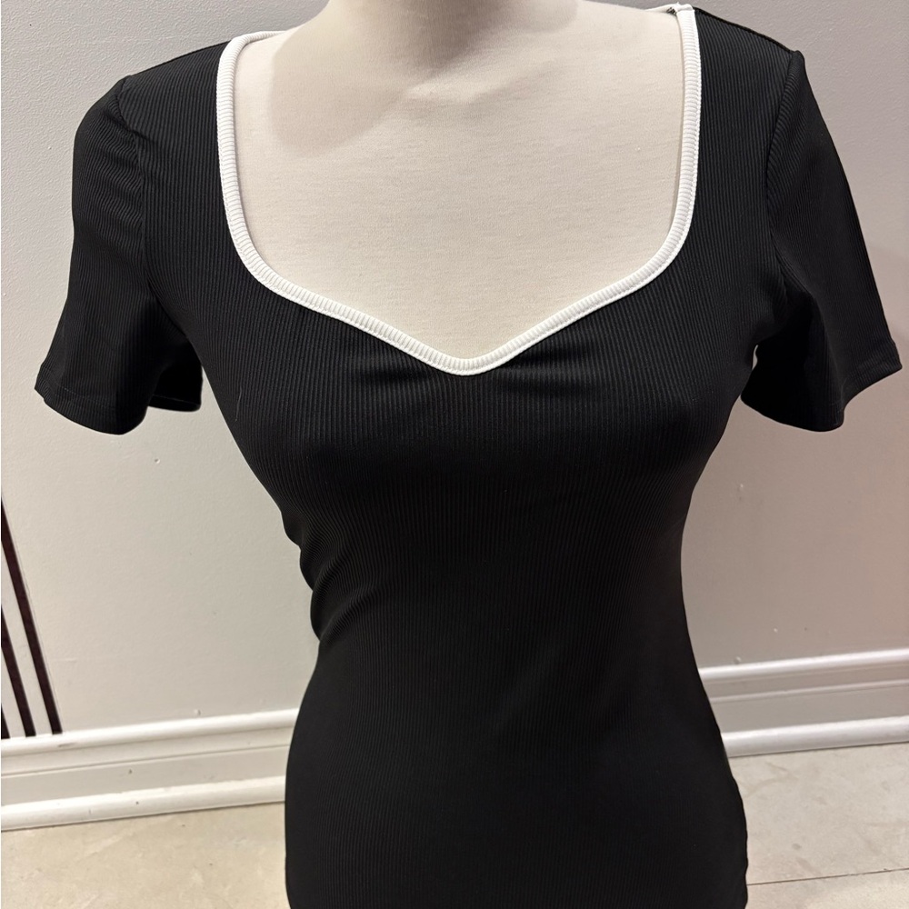 Elegant Black Women's Top with White Trim